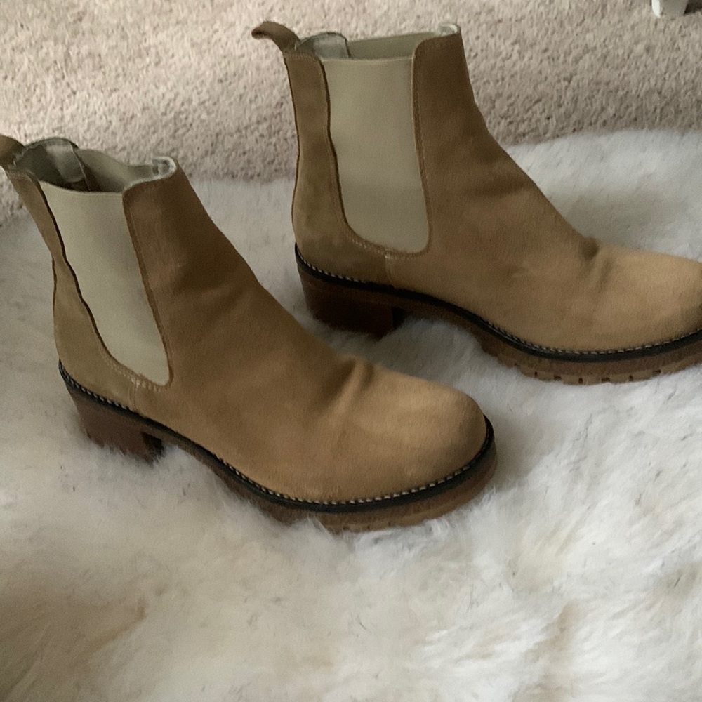 Tan suede rubber lug soles ankle boot.